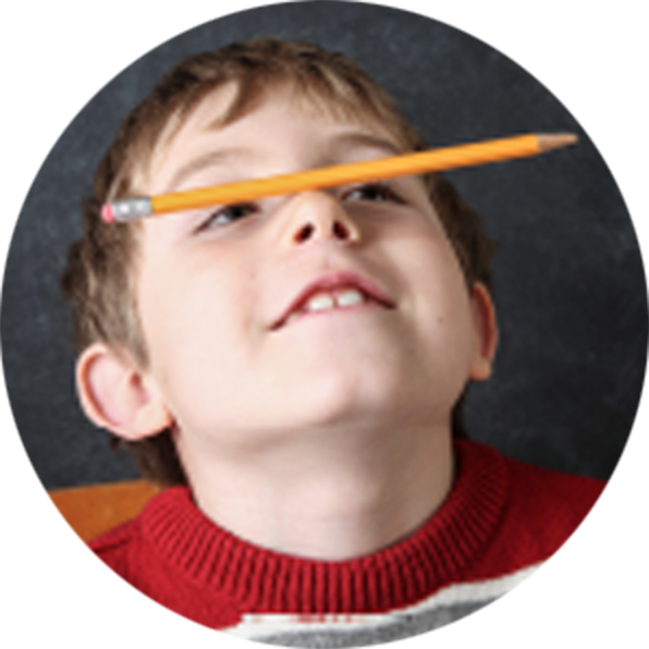 Boy With Combined Inattentive, Hyperactive, Impulsive ADHD Balances Pencil